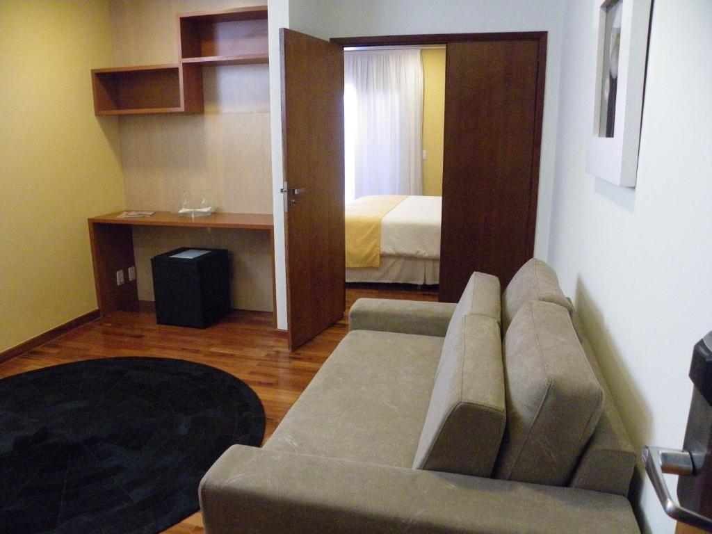 Ramada By Wyndham Furnaspark Formiga Phòng bức ảnh
